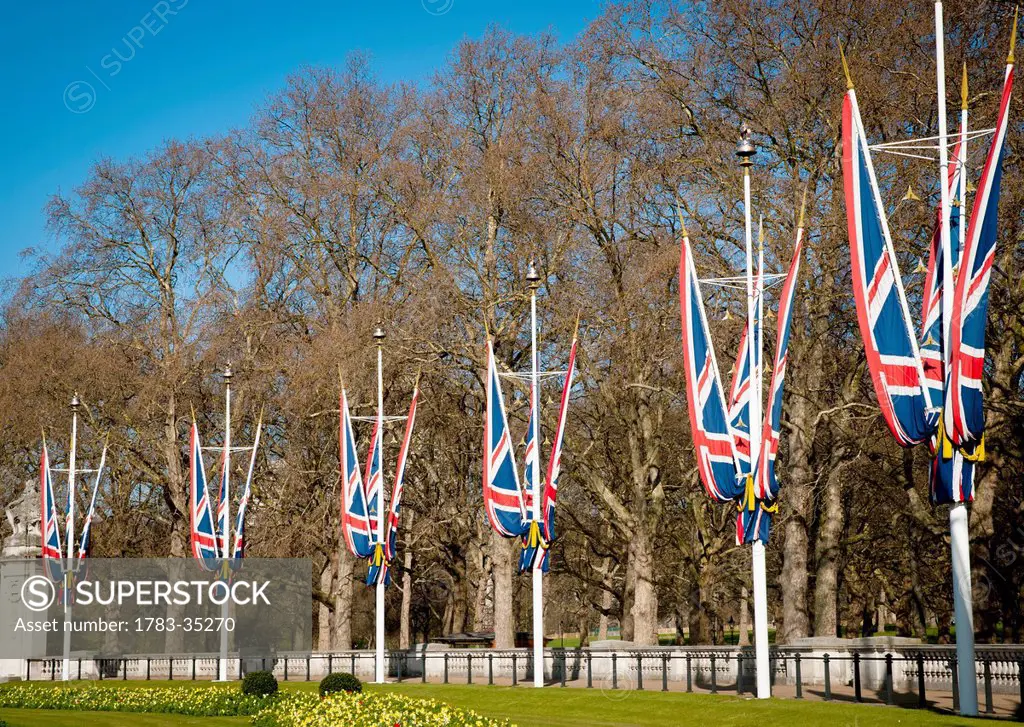 Uk, England, Union Jacks In Front Of Buckingham Palace; London