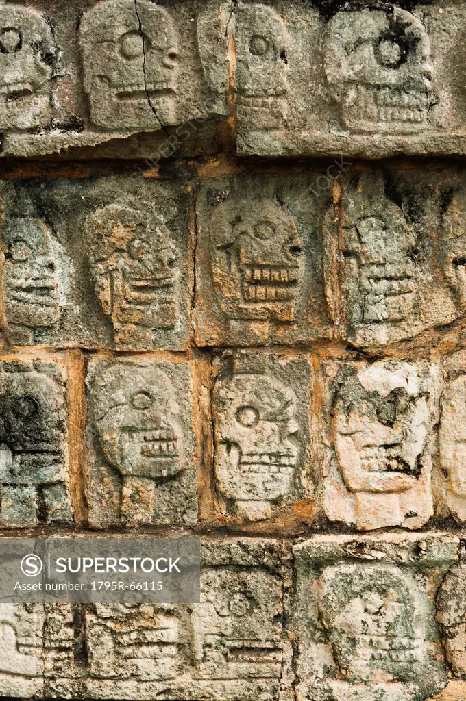 Mayan carvings representing human skulls