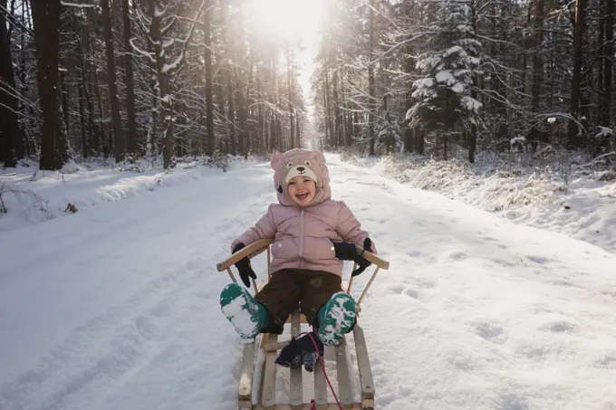 Poland, Subcarpathia, Girl having fun in winter