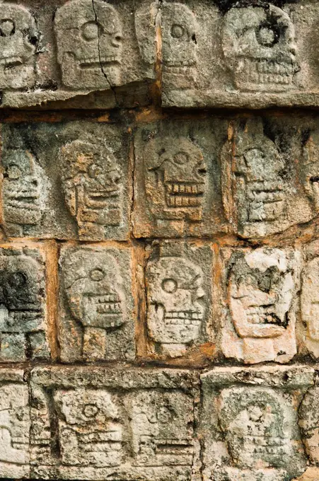 Mayan carvings representing human skulls