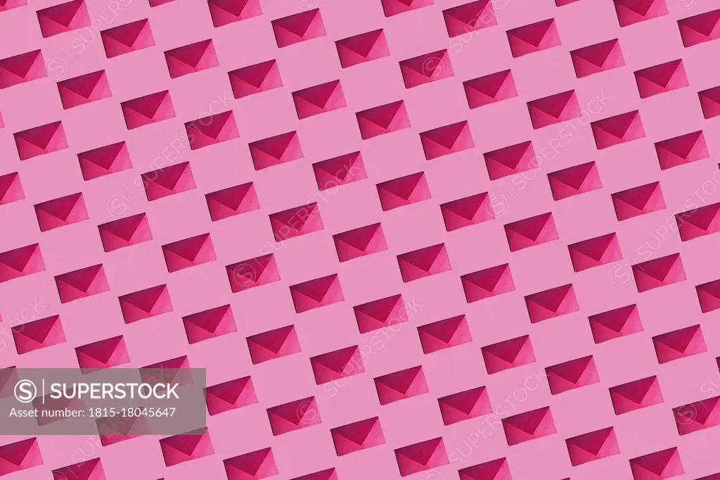Pattern of rows of pink envelopes