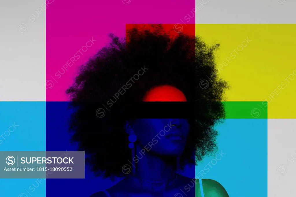 Afro woman with primary colors against white background