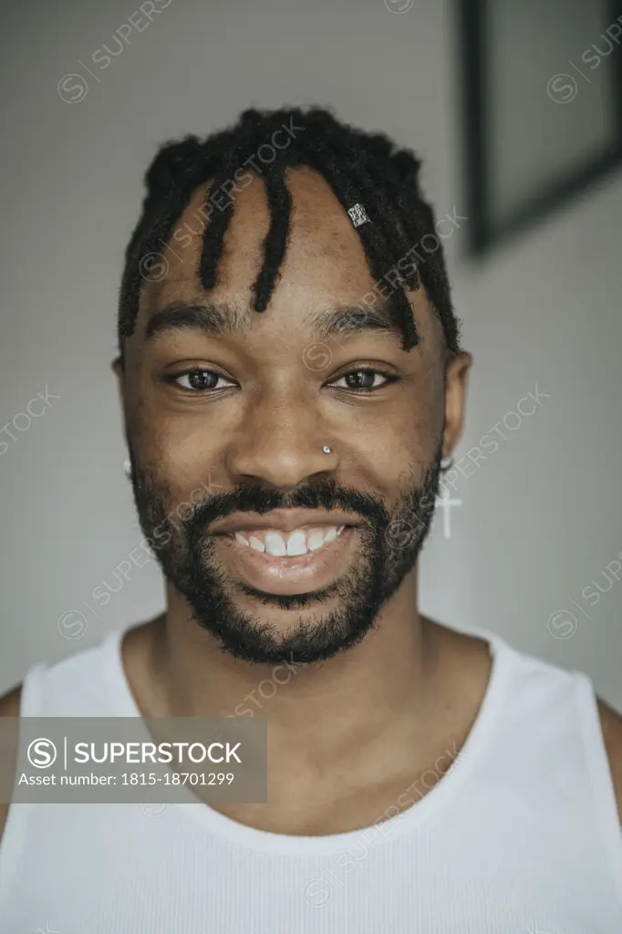 Young man with locs hairstyle