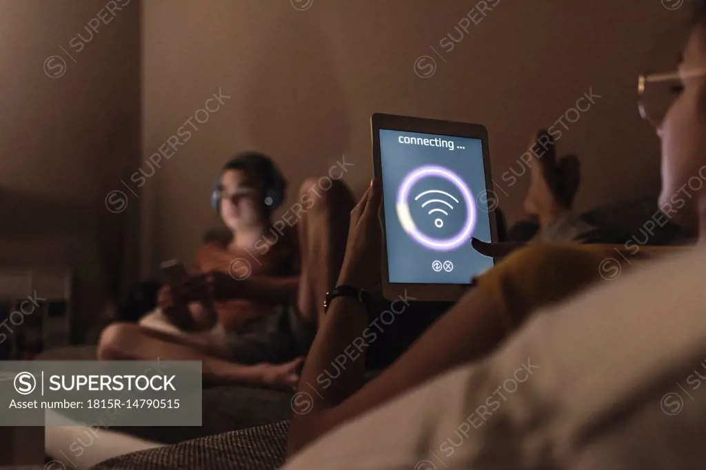 Couple relaxing on couch in smart home