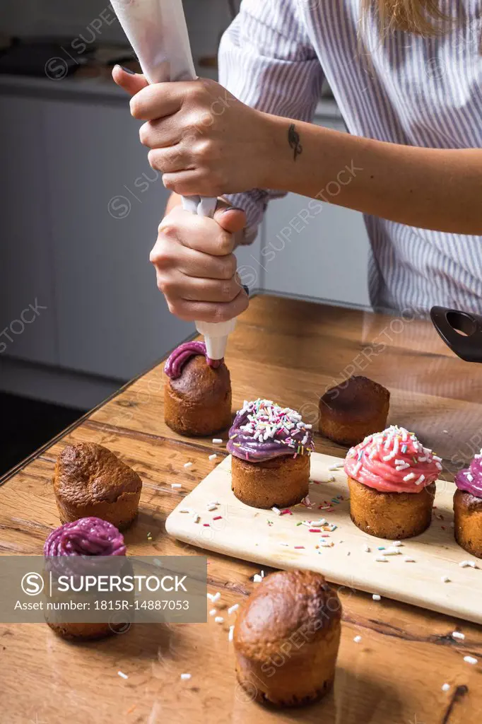 Woman preparing muffins at home