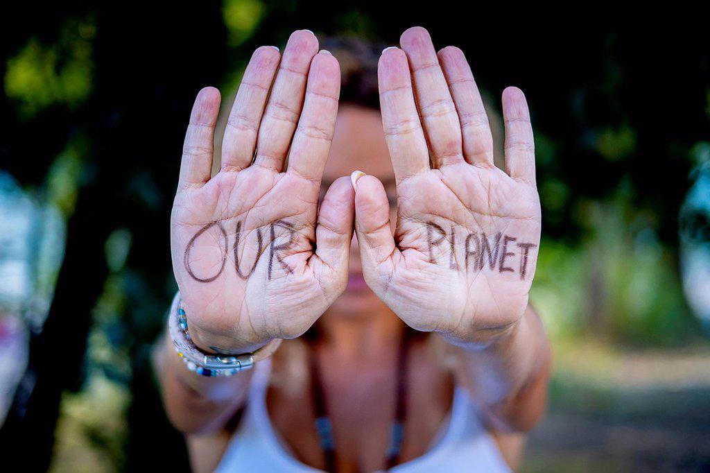 Woman showing message on palms
