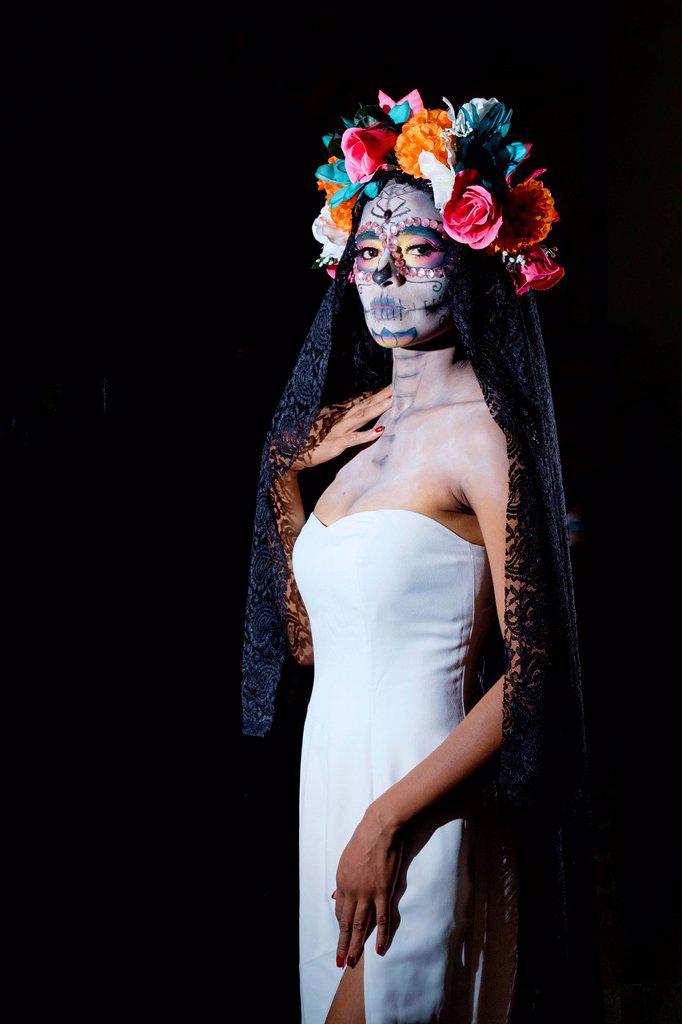 Woman dressed as La Calavera Catrina, Traditional Mexican female skeleton figure symbolizing death