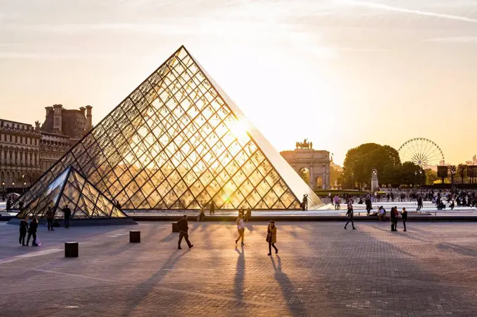 France, Paris, Glass pyramid at the Louvre musem at sunset