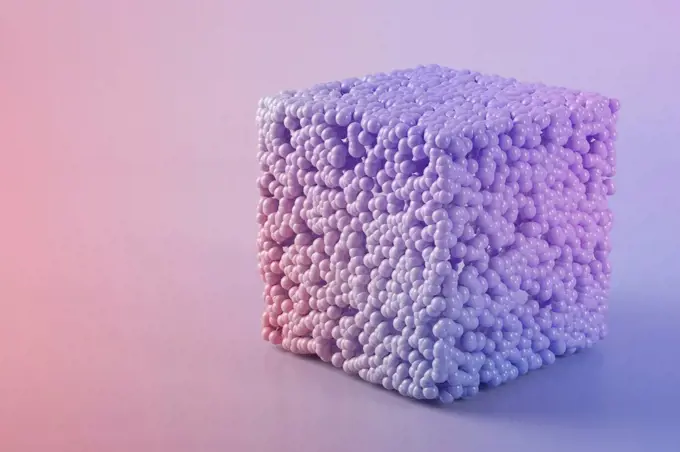 Three dimensional render of cube made of purple spheres