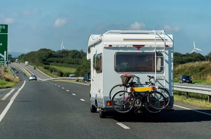 UK, Cornwall, Tintagel, Caravan with bike rack on country road