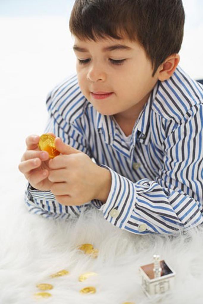 Close-up of Boy Playing with Dreidel   