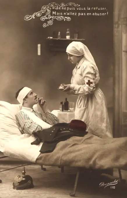 Red Cross Nurse striking match to light Wounded Soldier's Cigarette, Postcard by Revanche, France, 1914 