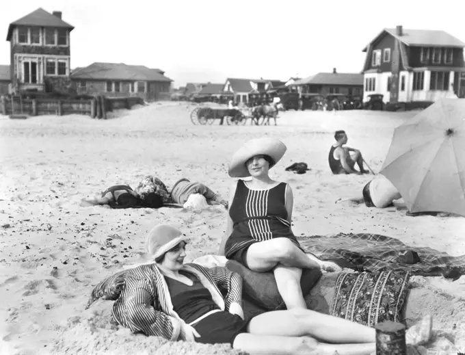 Two Women relaxing on Beach, Long Beach, New York, USA, Arnold Genthe, 1910's