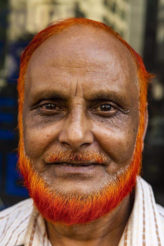 Man with a coloured beard, Kawran Bazar, Dhaka, Bangladesh, Asia