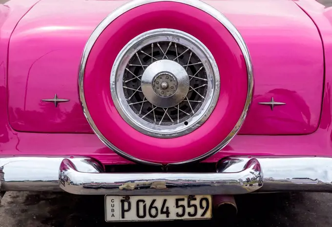 Pink convertible taxi, old American road cruiser, Havana, Cuba