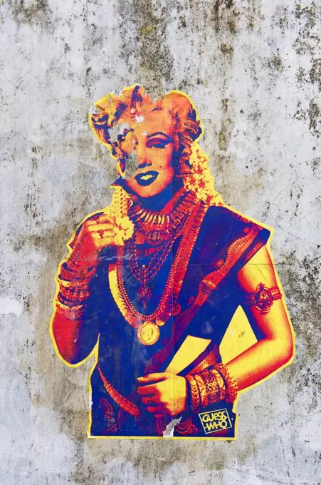 Marilyn Monroe wearing an Indian sari from the series Guess Who, unknown artist, graffiti on a wall in Kochi, international art exhibition of contempo...