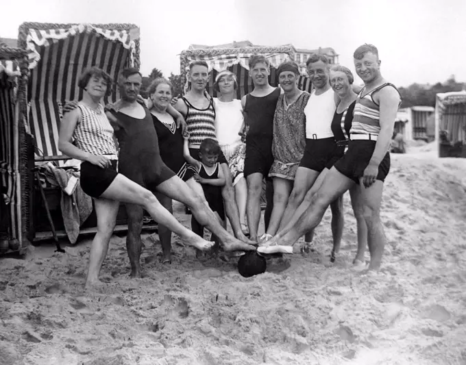 Group with bathers at the beach, funny, laughing, summer holidays, holiday, joie de vivre, about 1930s, Baltic Sea, Usedom, Mecklenburg-Western Pomera...