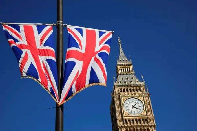 Union Jack flags fly in front of London's Big Ben, London, England, United Kingdom, Europe