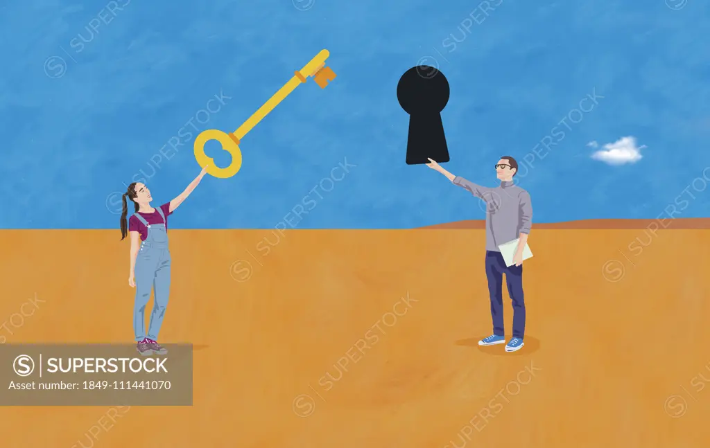 Woman holding large key for keyhole held by man
