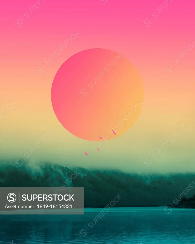 Huge sun in pastel coloured sky above lake