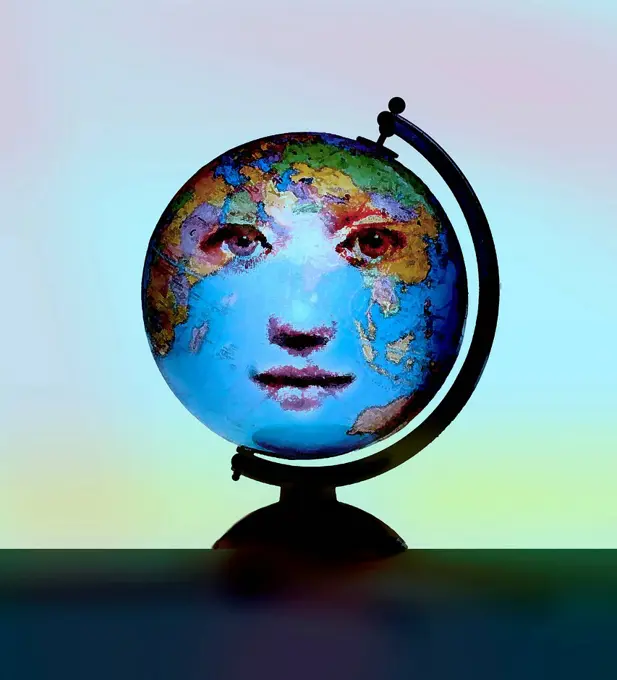 Face of woman on world globe