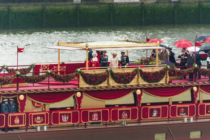 England, London, Thames Diamond Jubilee Pageant, London, UK, 3rd June 2012. Queen Elizabeth II, Prince Philip the Duke of Edinburgh, Camilla the Duchess of Cornwall and Charles the Prince of Wales, onboard the Spirit of Chartwell proceeding along River Thames, taken from Tower Bridge.