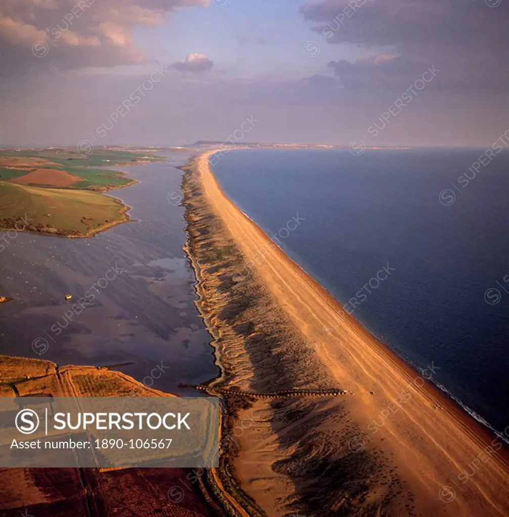 Aerial image of Chesil Beach Chesil Bank, 29 km long shingle beach, a  tombolo connecting mainland to the Isle of Portland, Jurassic Coast, UNESCO  Worl - SuperStock