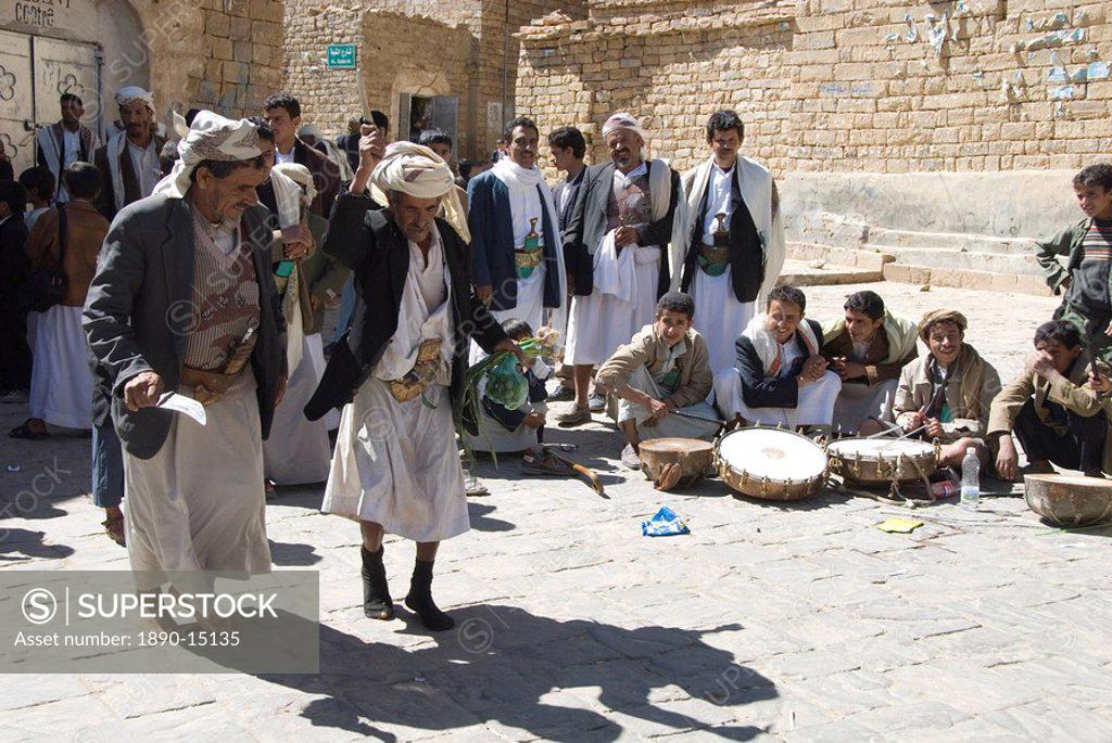 Traditional dancing by men at wedding ceremony in village ...