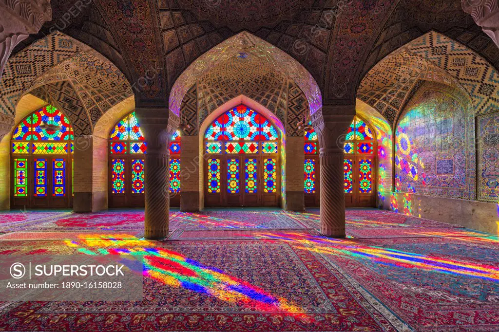 Nasir-ol-Molk Mosque (Pink Mosque), light patterns from colored stained glass illuminating the iwan, Shiraz, Fars Province, Iran, Middle East