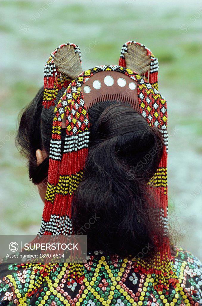 Close_up of head_dress of comb and beads of a woman of the T&apos,boli ...