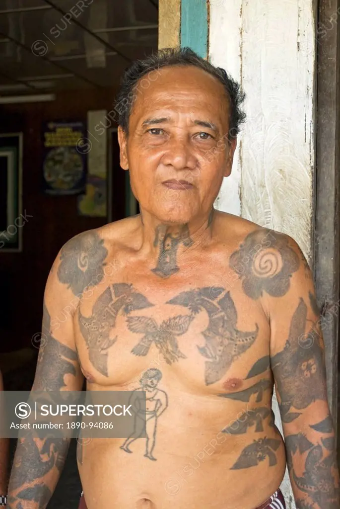 Jugah, an Iban tribal longhouse head man Tuai Rumah, with traditional  warrior tattoos, Kapit district, Sarawak, Malaysian Borneo, Malaysia,  Southeast ... - SuperStock