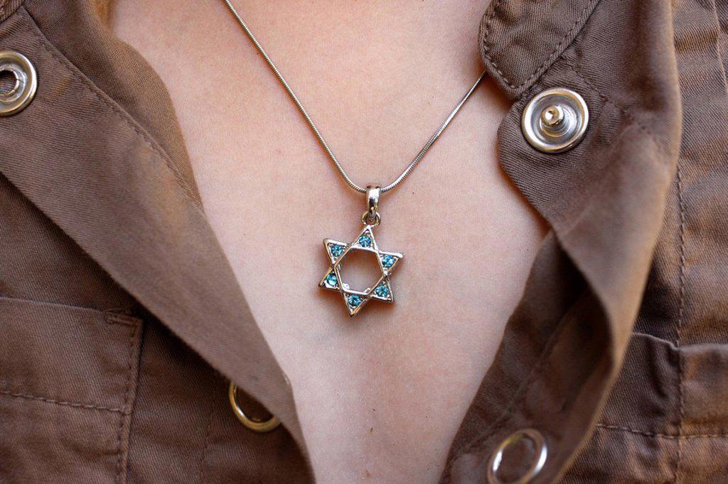 A 10_year_old girl wearing Star of David jewelry, Hertzliya, Israel, Middle East