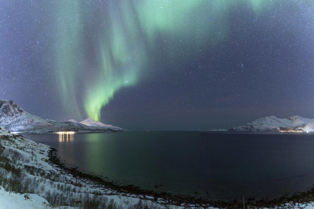 The Northern Lights (aurora borealis) lighting up the sky near Tromso, Norway, Scandinavia, Europe