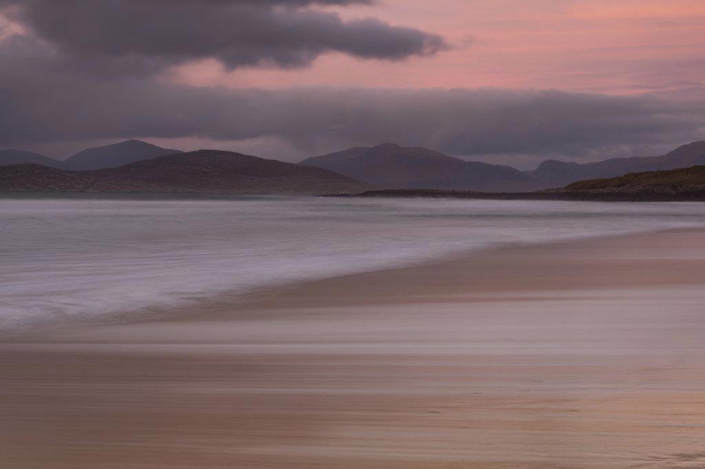 Scarista Beach backed by the Harris Hills at sunset, Isle of Harris, Outer Hebrides, Scotland, United Kingdom, Europe