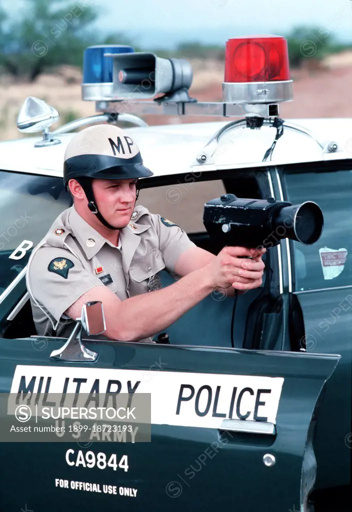 1976 - A US Army military policeman uses radar speed detection equipment. 