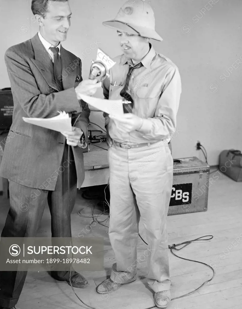 Poston, Arizona. The contractor's Superintendant, Newell, with CBS Announcer, Chet Huntley at the microphone during the broadcast of 'Strange Ports of Call' 5/26/1942. 