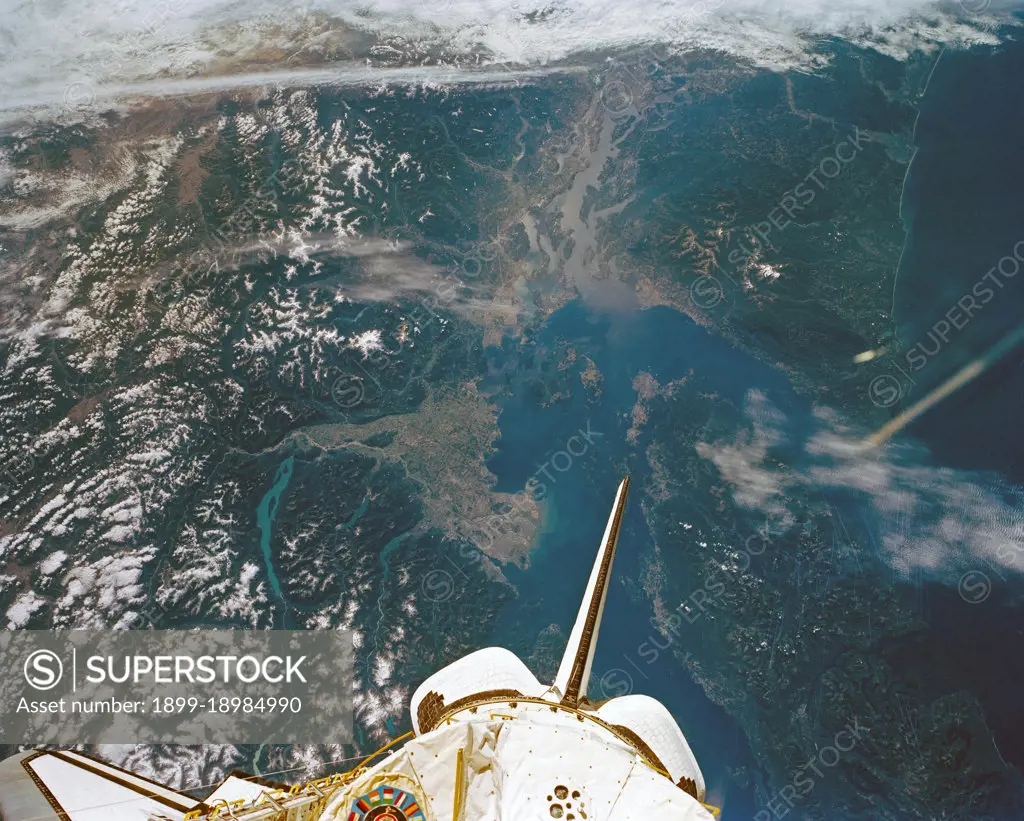 (12 - 20 Sept 1992) --- In this large format camera image, the forested Cascade Range appears along the left side; the Pacific Ocean, on the right. The frame was photographed as the Space Shuttle Endeavour flew north to south over Vancouver and Seattle.. 