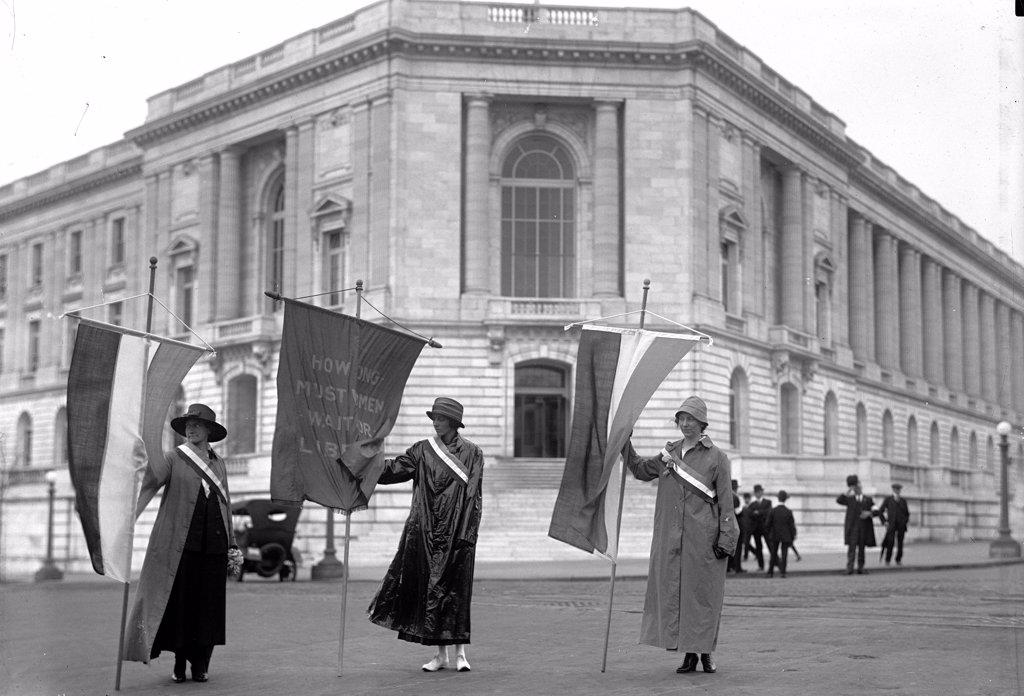 Woman suffragettes picketing at the senate office building, Mildred Gilbert, Pauline Floyd, and Vivian Pierce circa 1918.