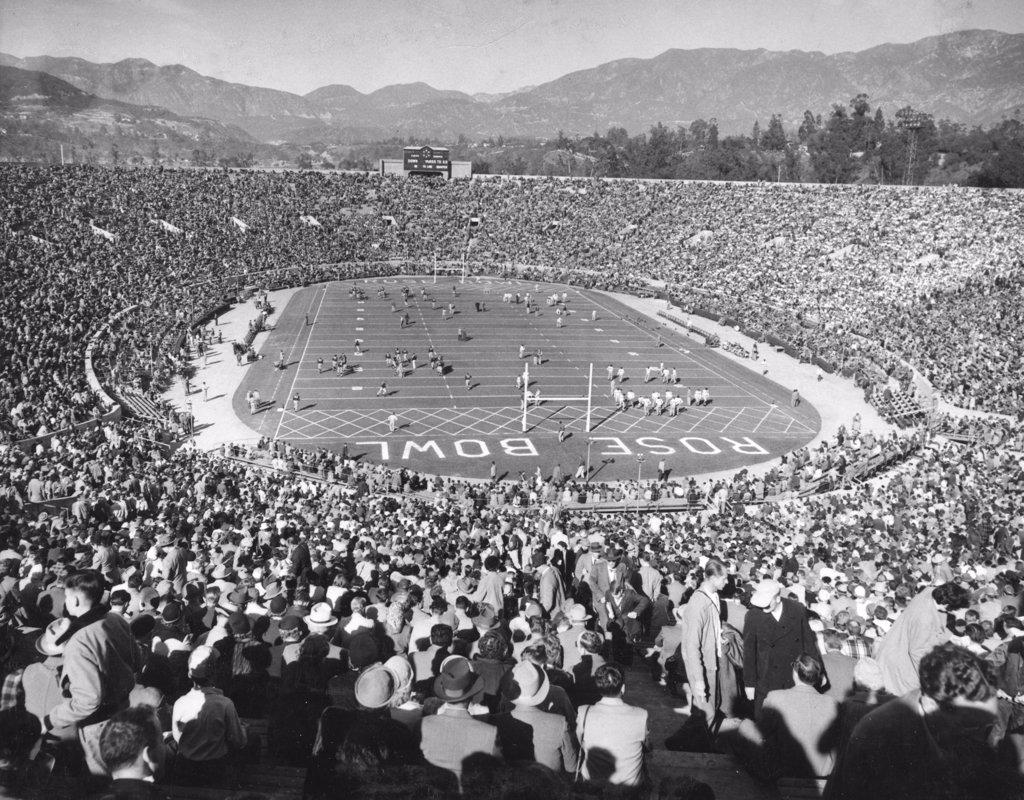 Elevated view of football fans crowded into the Rose Bowl Stadium to watch the California Golden Bears, champions of the Pacific Coast Conference, battle the Michigan Wolverines, winners of the Big Ten Conference, Pasadena, CA, 1/1/1951. (Photo by INP/United States Information Agency/GG Vintage Images)