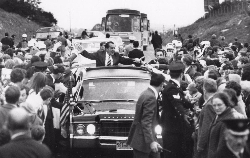 President Richard M. Nixon's motorcade is surrounded by crowds during his three-day visit to that country. Ireland, 10/3/70.  