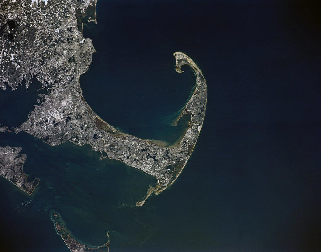 (2 March 1990) --- Surrounded by waters of the Atlantic Ocean, Cape Cod Bay and Nantucket Sound, the jutting Cape Cod feature caught the attention of the astronaut crewmembers aboard the Earth-orbiting Space Shuttle Atlantis, 126 nautical miles above Earth. Parts of Martha's Vineyard and Nantucket are in bottom left corner. Plymouth Bay is in upper left corner. Center point coordinates are 42 degrees north latitude and 70 degrees west longitude.. 