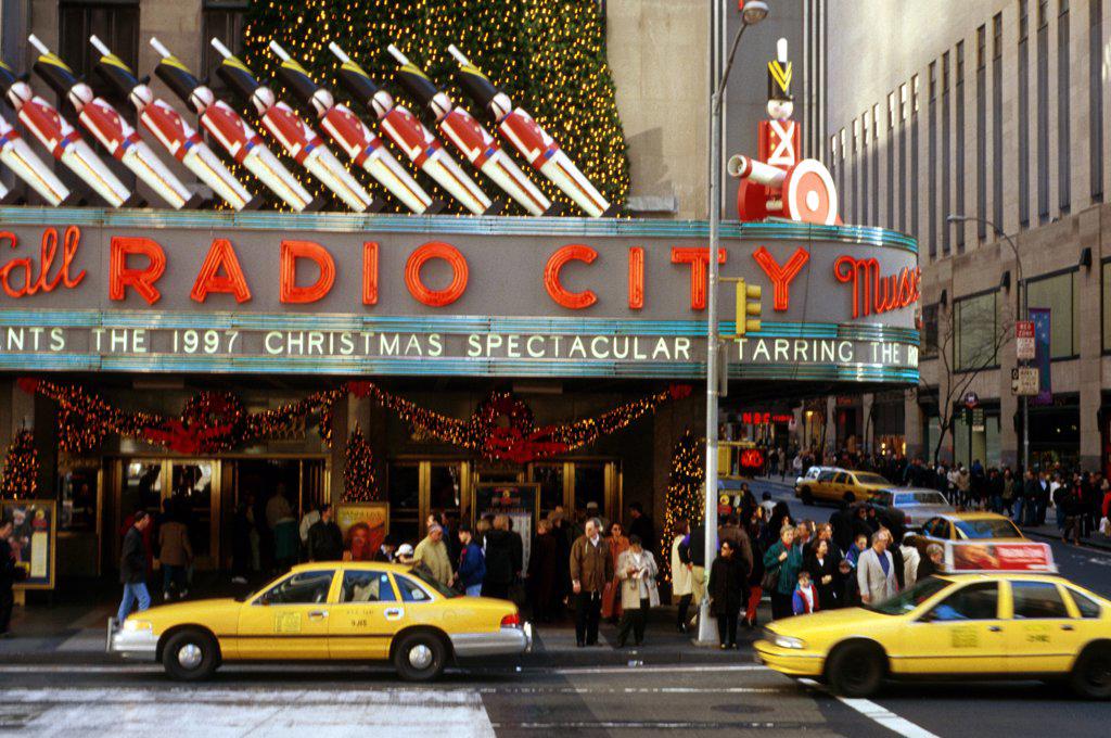 New York City, Manhattan. Exterior Of Radio City Music Hall With Sign For 1997 Christmas Spectacular.