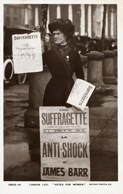 Postcard of a Suffragette Holding Newspapers. Postcard of a Suffragette Holding Newspapers 