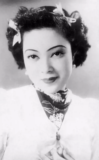 Yoshiko made her debut as an actress and singer in the 1938 film Honeymoon Express. She was billed as Li Xianglan, pronounced Ri Koran in Japanese. The adoption of a Chinese stage name was prompted by the Film company's economic and political motives—a Manchurian girl who had command over both the Japanese and Chinese languages was sought after. From this she rose to be a star and Japan-Manchuria Goodwill Ambassadress. Though in her subsequent films she was almost exclusively billed as Li Xianglan; she indeed appeared in a few as 'Yamaguchi Yoshiko.' Many of her films bore some degree of promotion of the Japanese national policy (in particular pertaining to the Greater East Asia Co-prosperity Sphere ideology). At the end of World War II, she was arrested by Chinese government for treason and collaboration with the Japanese. However, she was cleared of all charges, and possibly the death penalty, since she was not a Chinese national, and thus the Chinese government could not try her for
