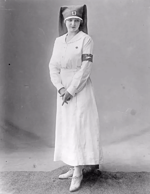 American Red Cross uniform modeled by a Red Cross nurse. ca.  between 1910 and 1920.