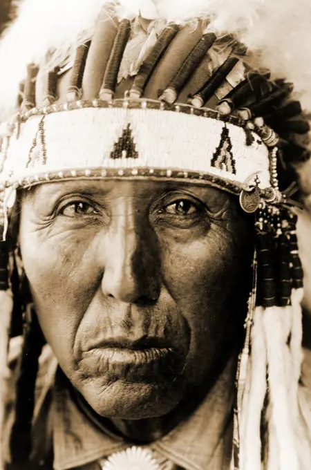 Edward S. Curtis Native American Indians - Red Bird, a Cheyenne man in full headdress ca. 1927. 