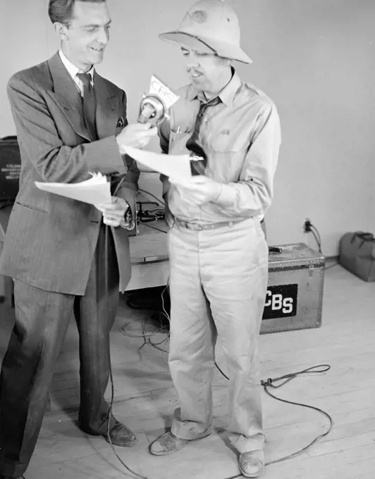 Poston, Arizona. The contractor's Superintendant, Newell, with CBS Announcer, Chet Huntley at the microphone during the broadcast of 'Strange Ports of Call' 5/26/1942. 