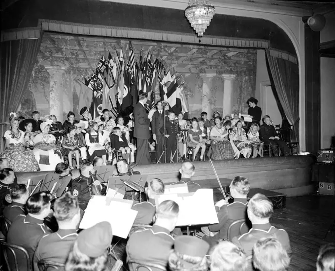 Children of Diplomats say 'Merry Christmas' to people of all nations. Washington, D.C., Dec. 20. The Eighth Annual International Broadcast of 'Merry Christmas' to children of all nations from sons and daughters of diplomats stationed here in Washington got under way tonight at 5:00 p.m.  12/20/1939. 