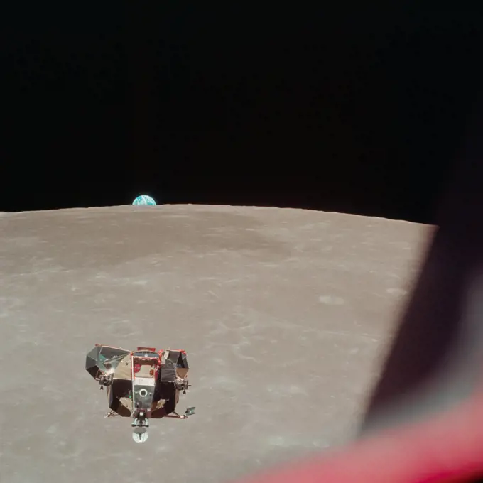 The Apollo 11 Lunar Module (LM) ascent stage, with astronauts Neil A. Armstrong and Edwin E. Aldrin Jr. onboard, is photographed from the Command and Services Modules (CSM) in lunar orbit.. 