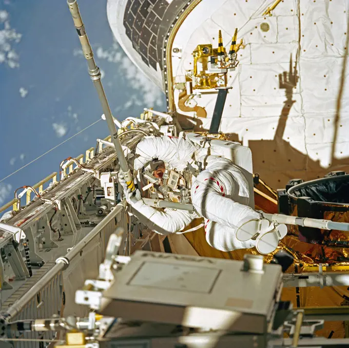(14 May 1992) --- Astronaut Thomas D. Akers joins three struts together, as fourth period of extravehicular activity (EVA) proceeds in the Space Shuttle Endeavour's cargo bay.  The purpose of the final EVA on this nine-day mission was the evaluation of Assembly of Station by EVA Methods (ASEM).  The scene was recorded on 70mm film by a fellow crew member in the Space Shuttle's cabin.  . 